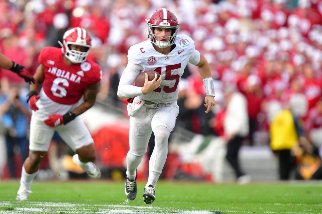 Alabama Crimson Tide quarterback Ty Simpson (15) running with the ball against the Indiana Hoosiers in the 2026 Rose Bowl.