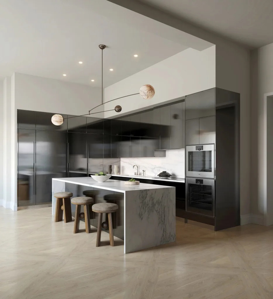 The contemporary kitchen features flush-panel cabinetry and Gaggenau appliances. Courtesy of The Flatiron Building