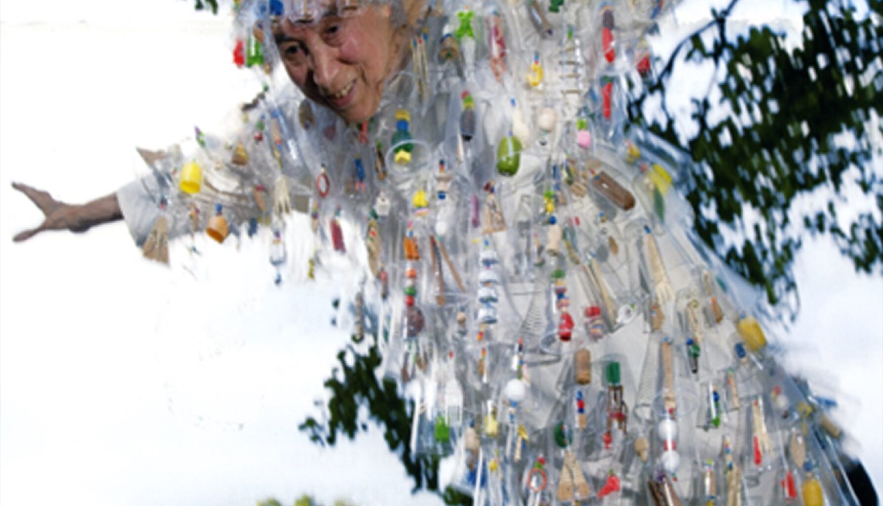 Takako Saito in handmade performance costume zip-lining in 2006. Museo d’Arte Contemporaine di Villa Croce - Genoa, Italy. Photo: Takako Saito Archive.