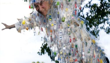 Takako Saito in handmade performance costume zip-lining in 2006. Museo d’Arte Contemporaine di Villa Croce - Genoa, Italy. Photo: Takako Saito Archive.