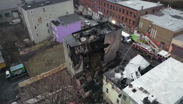 News 12 | Westchester | Yonkers fire destroys buildings as fire crews douse hot spots