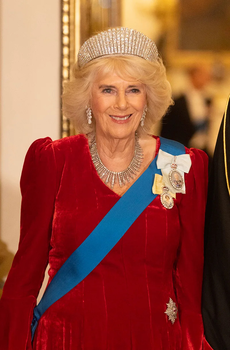 LONDON, ENGLAND - DECEMBER 3: Queen Camilla attends the state banquet for the Emir of Qatar Sheikh Tamim bin Hamad Al Thani at Buckingham Palace during day one of The Amir of the State of Qatar's visit to the United Kingdom on December 3, 2024 in London, England. His Highness Sheikh Tamim bin Hamad Al Thani, Amir of the State of Qatar, accompanied by Her Highness Sheikha Jawaher bint Hamad bin Suhaim Al Thani, will hold several engagements with The Prince and Princess of Wales, The King and Queen as well as political figures. (Photo by Ian Vogler - WPA Pool / Getty Images)
