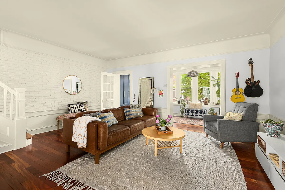 bay ridge - living room with view into a sun room