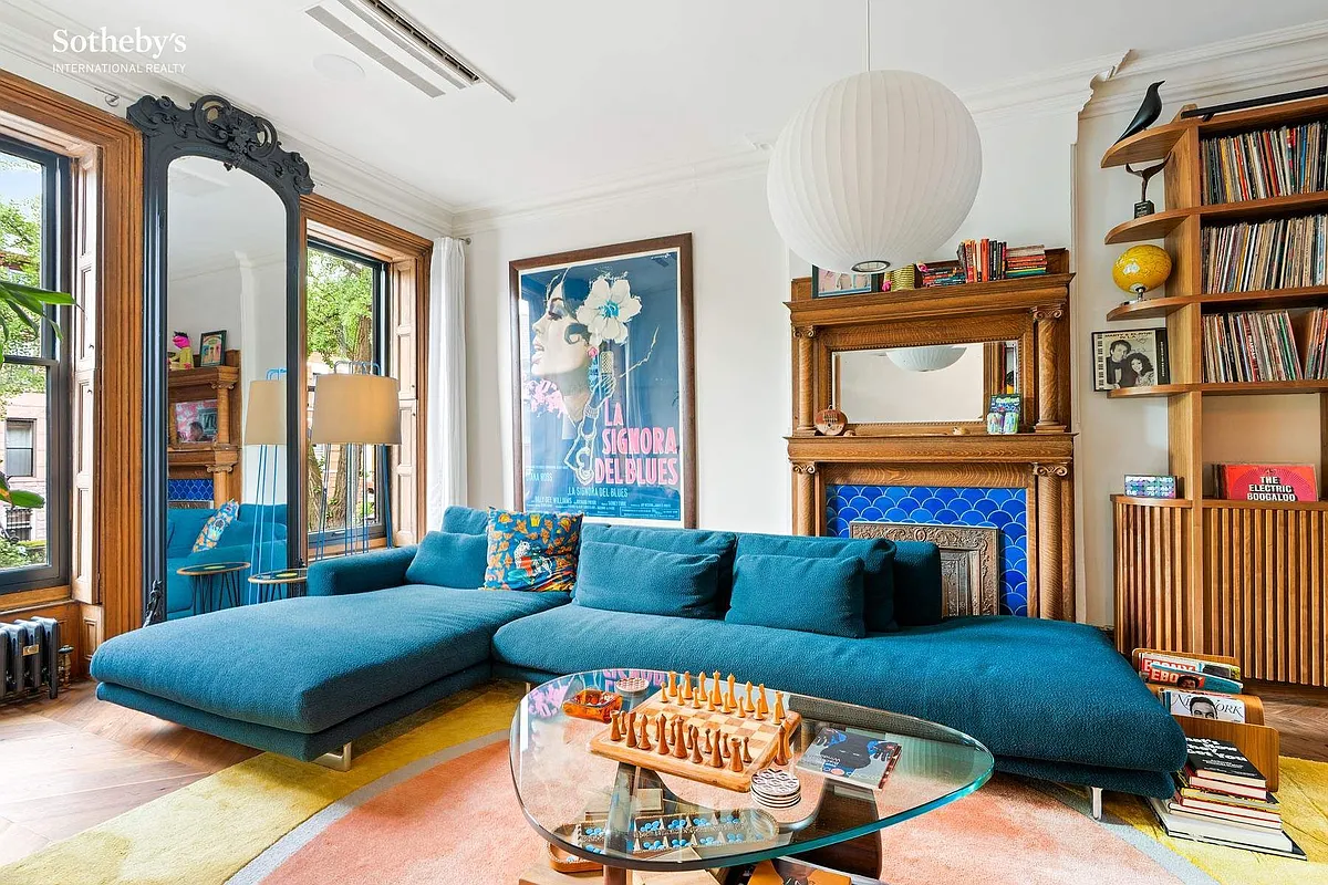 bed stuy parlor with a pier mirror, mantel