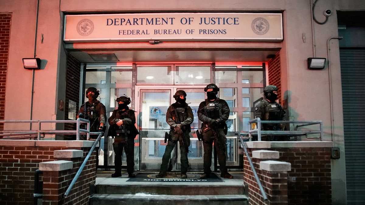 Federal officers stand guard outside the Department of Justice next to the Metropolitan Detention Center in Brooklyn after the U.S. captured Nicolás Maduro and his wife, in New York City, Jan. 3, 2026.