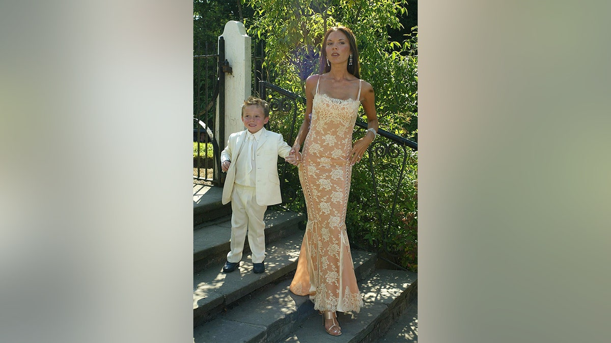 Brooklyn and Victoria Beckham at a wedding in 2003.