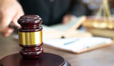 judge bangs gavel on stand