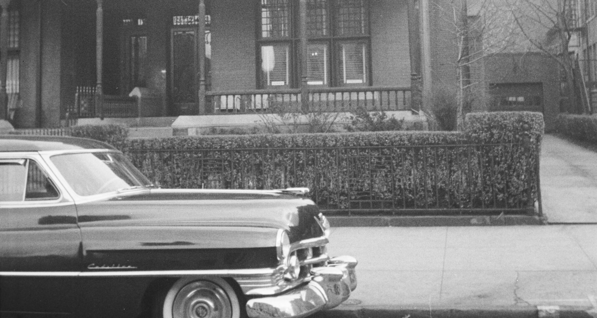 black and white photo of a car