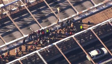 Anti-ICE protesters cross Brooklyn Bridge in MLK Day demonstration