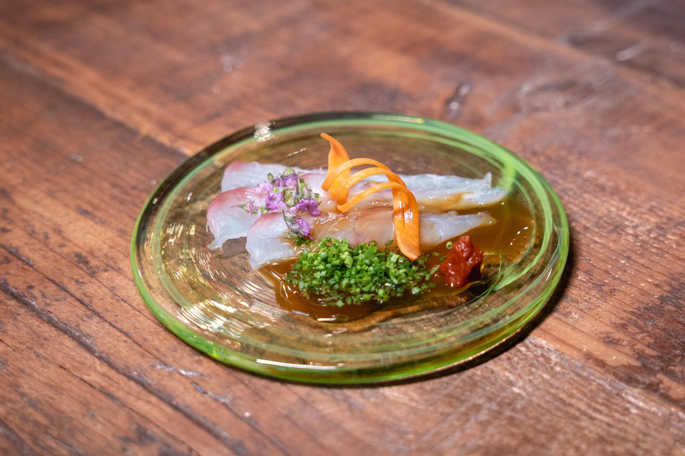 Usuzukuri: hirame-fluke, ponzu yoshino, shiso flower, and chives.