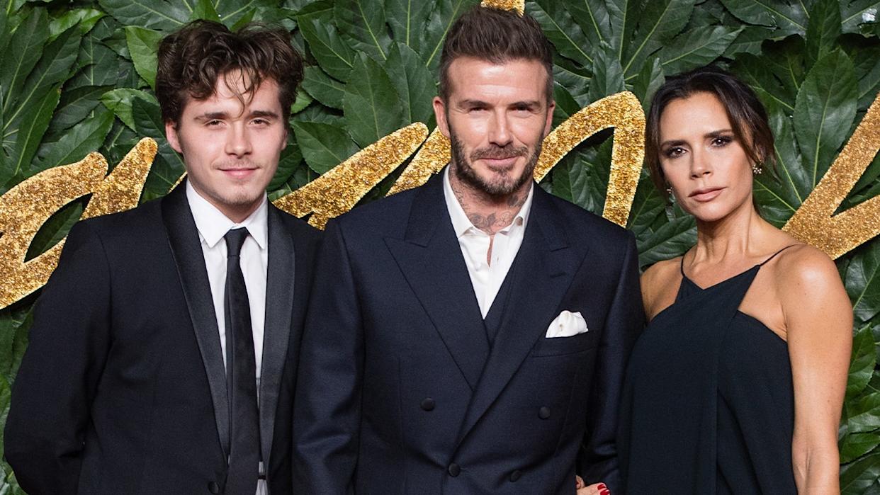 Brooklyn Beckham and his parents