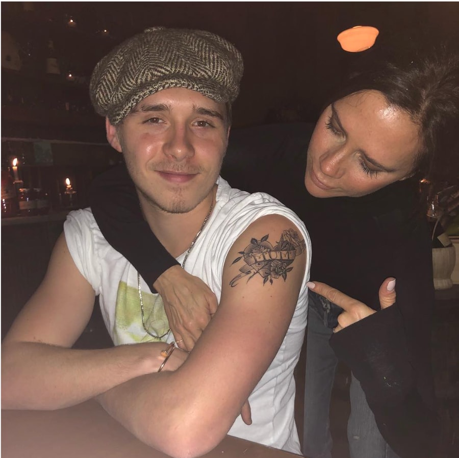 Brooklyn and Victoria Beckham