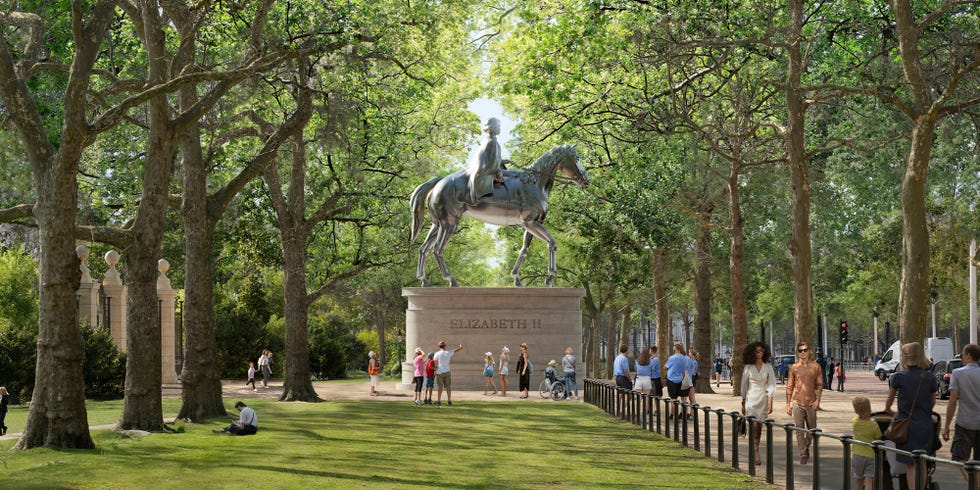 Statue of Elizabeth II on horseback situated in a green park.