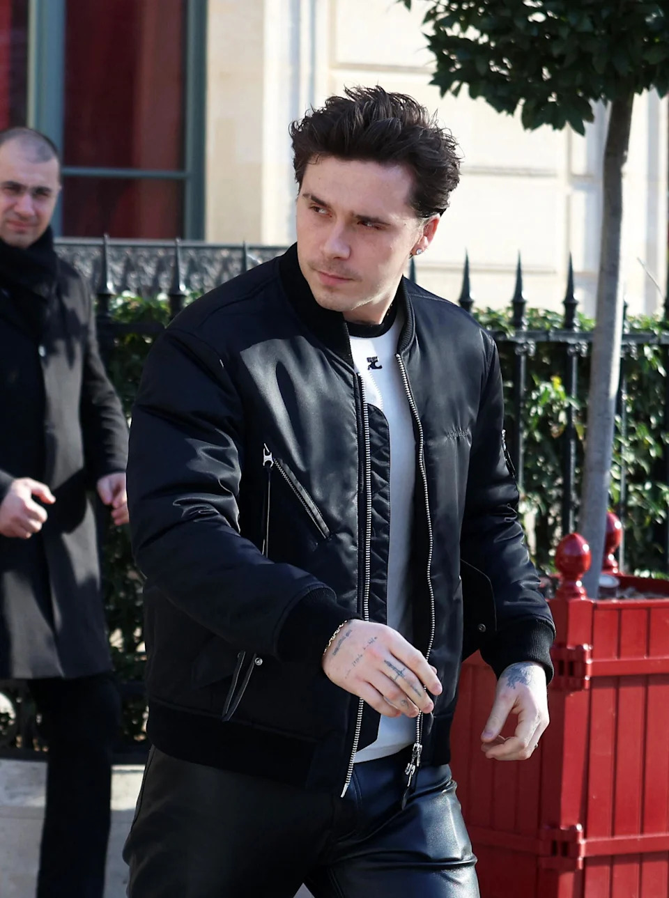 Brooklyn Beckham leaves his hotel