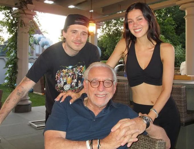 Brooklyn Beckham with Nicola Peltz and Nelson Peltz