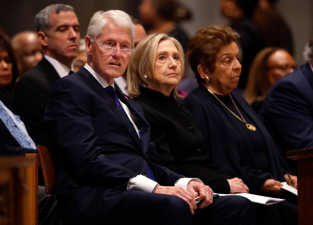 Former President Bill Clinton, Hillary Clinton, and Donna Shalala attend the funeral service for former Labor Secretary Alexis Herman.