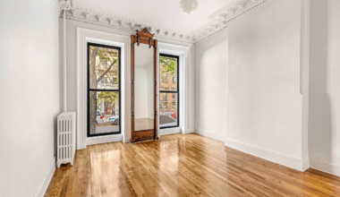 parlor with pier mirror and plasterwork