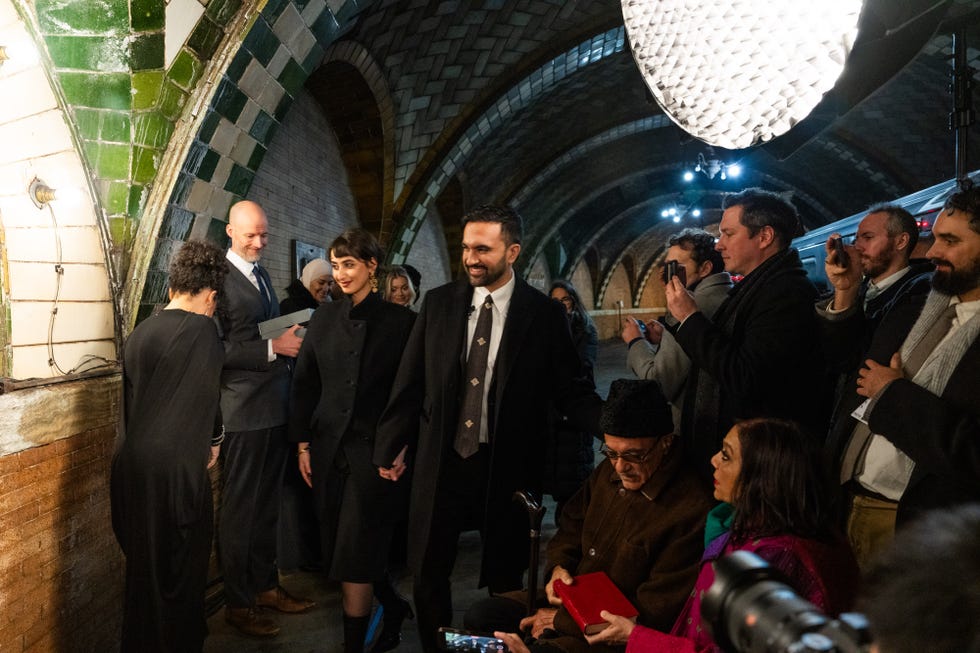 new york, new york january 1: zohran mamdani arrives with his wife rama duwaji to be sworn in as new york citys 112th mayor in the former city hall subway station on january 1, 2026 in new york city. mamdani’s term as mayor begins immediately in the new year, and a public inauguration will also take place in the afternoon at city hall. (photo by amir hamja pool/getty images)