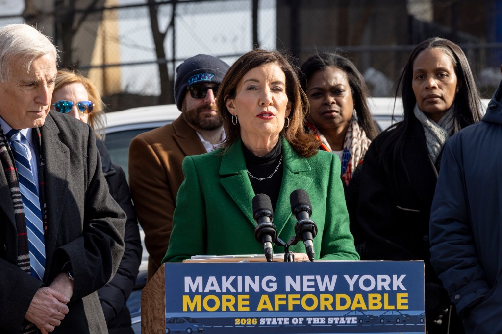 Governor Kathy Hochul at a press conference on Ward Island announcing legislation to lower car insurance costs.
