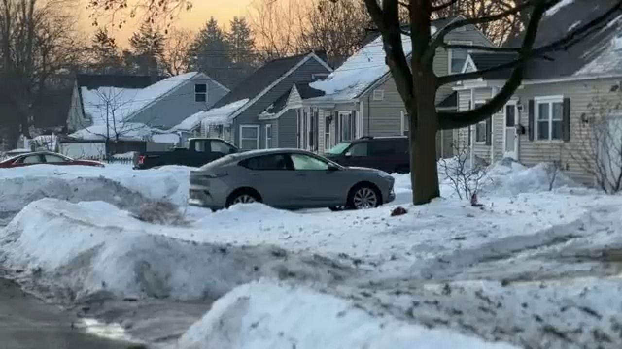 A row of houses in the snow