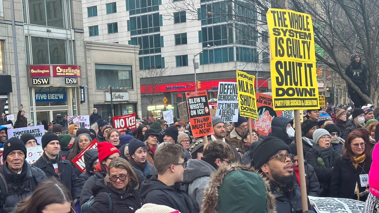 Demonstrators marched in solidarity with Minnesota, where communities say immigration enforcement has sharply intensified. (Spectrum News NY1)