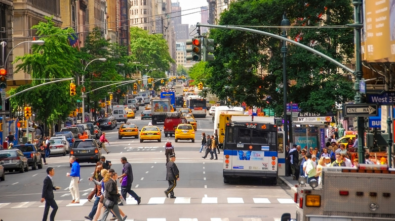 People walking across the street in Manhattan
