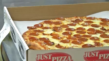Local pizza shop prepares gameday orders