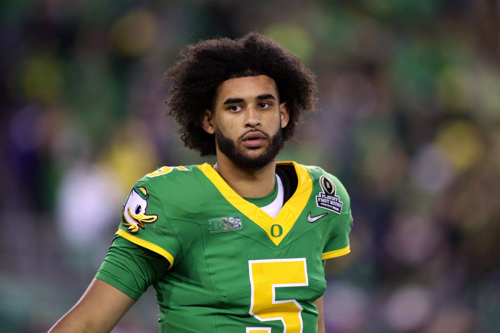 Oregon quarterback Dante Moore (5) looks on during the first half of the first round of the NCAA College Football Playoff against James Madison, Saturday, Dec. 20, 2025, in Eugene, Ore.