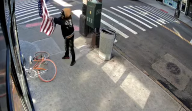 Video shows American flag being slashed "to ribbons" outside Queens bar