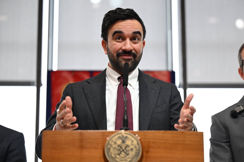 Mayor Zohran Mamdani making a junk fees-related announcement at a press conference.