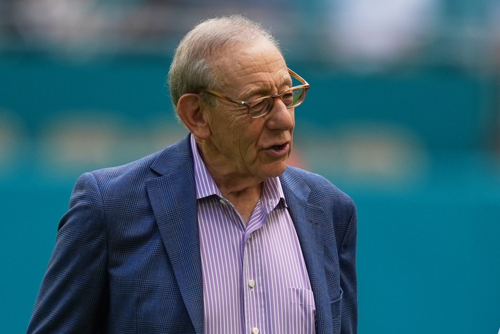 Miami Dolphins owner Stephen Ross looking on.