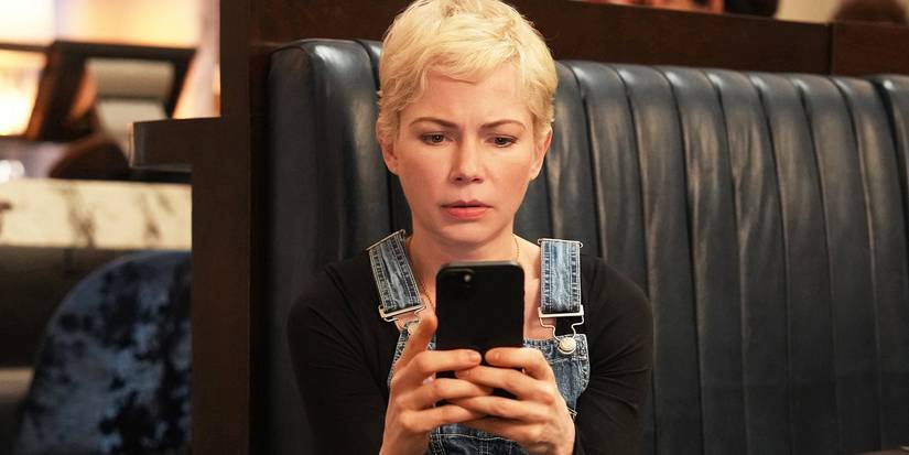 Michelle Williams' Molly staring at the phone with concern in Dying for Sex