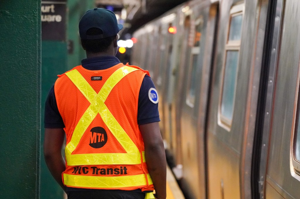 The maniac exchanged words with the 37-year-old transit worker on board a Manhattan-bound A train passing through Beach 25th Street in Far Rockaway around 1:30 a.m. before slugging him in the face, according to authorities and sources.