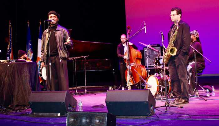 Vocalist Tyreek McDole, left, leading the Jazz Quintet, with Caelan Cardello, piano, Dylan Band, saxophone, Dan Finn, bass, and Gary Jones III, drums. The exceptional musical performance closed out the annual commemoration of MLK on Jan.18, in the Goldstein Theatre at CUNY Queens College, in Flushing.