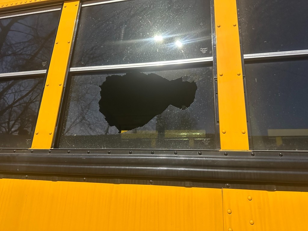a close up of the hole in the bus windwo