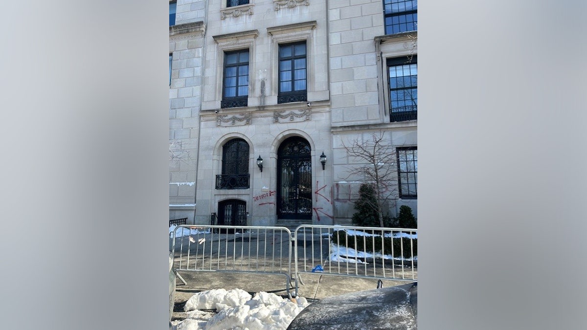 Spray paint on a gated off building