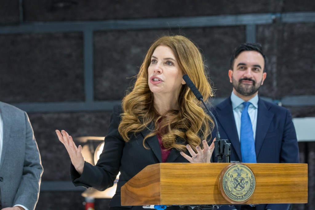 New York City Council Speaker Julie Menin speaking at a press conference with Mayor Zorhan and Raphael Espinal.