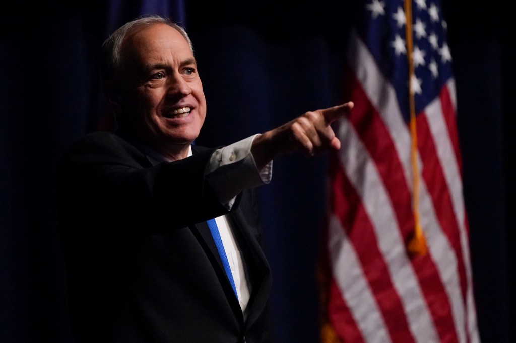 New York Comptroller Tom DiNapoli speaking and pointing at the New York State Democratic Convention.