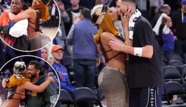 Megan Thee Stallion kisses Klay Thompson after Mavericks' win over Knicks