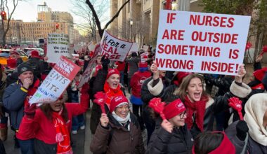 Members of the New York State Nurses Association union picket