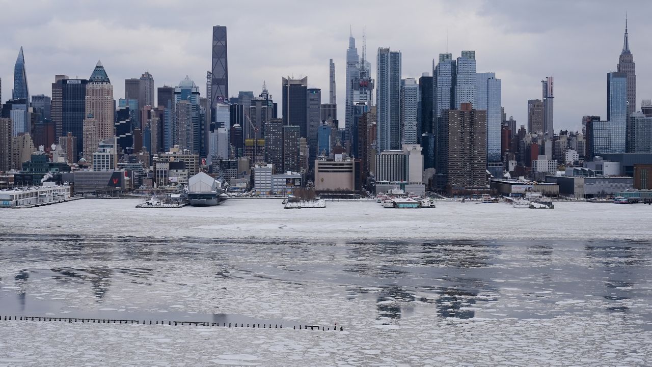 Ice floats on the Hudson River in front of the New York City skyline, as seen from Weehawken, N.J., Monday, Jan. 26, 2026. (AP Photo/Seth Wenig)