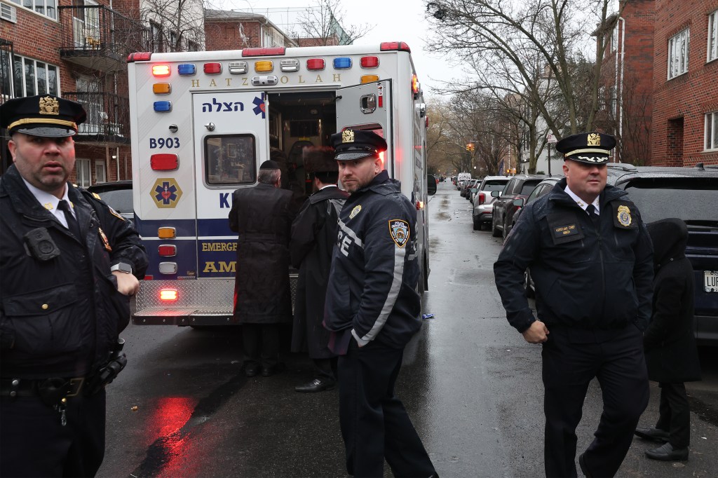 NYPD officers conducting an investigation into a child struck by a Hatzolah Ambulance on 1532 52nd Street in Brooklyn.