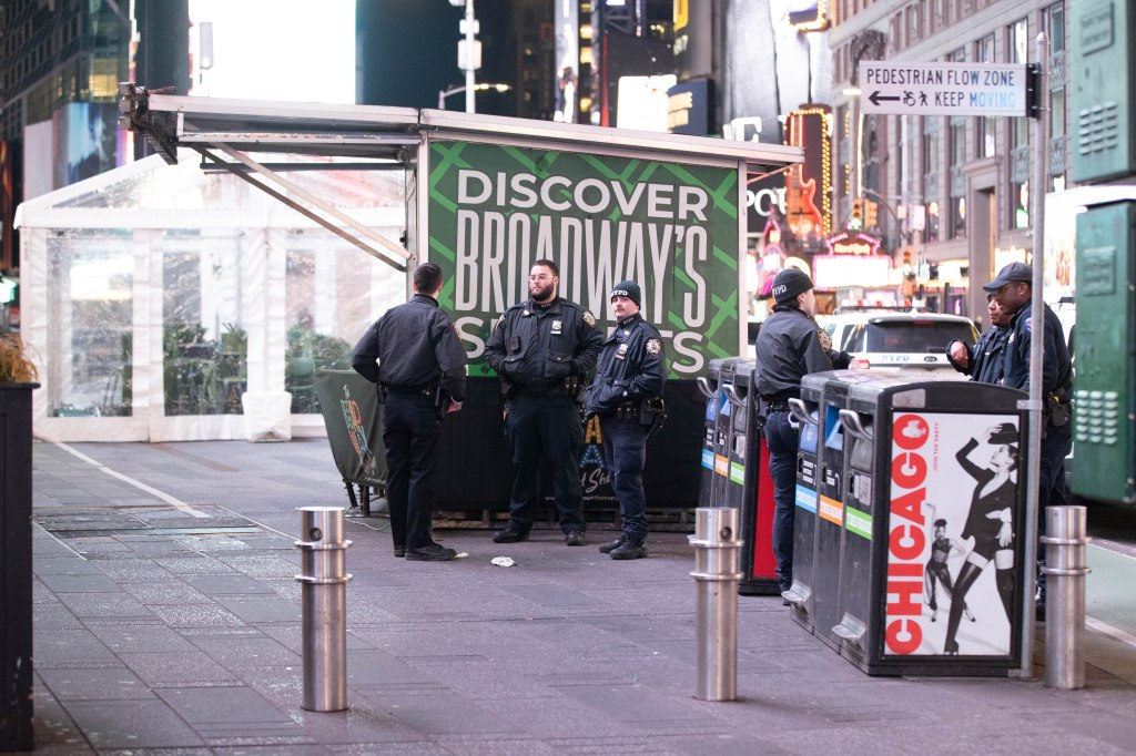 Police are seen at the scene of a stabbing at 1528 Broadway at 45th St. in Manhattan, Tuesday, Jan. 13, 2026. 