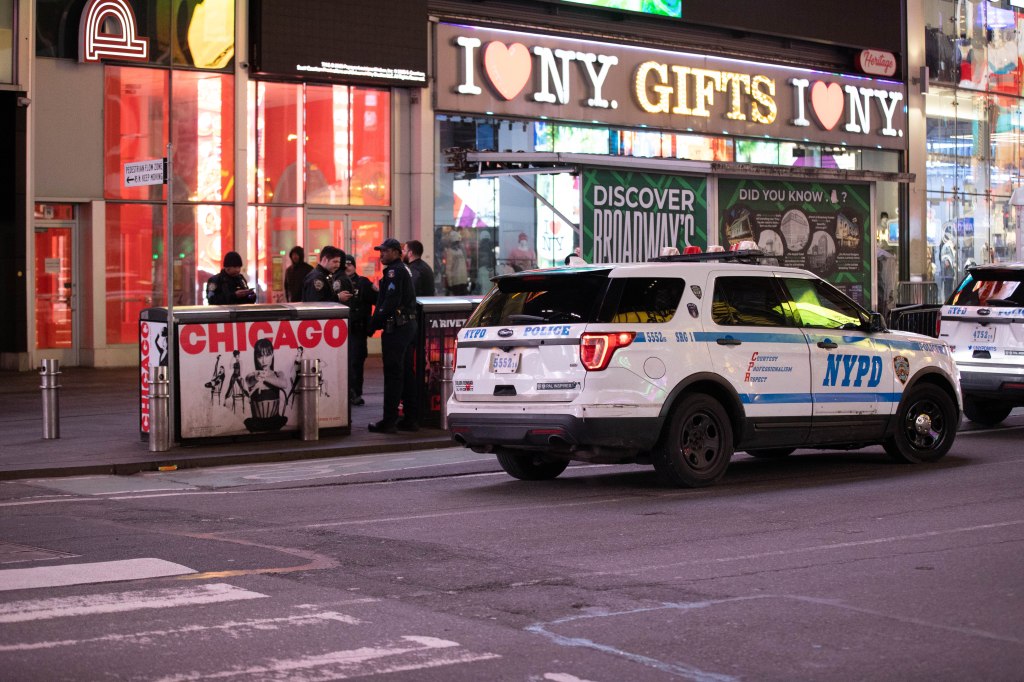 Police are seen at the scene of a stabbing at 1528 Broadway at 45th St. in Manhattan, Tuesday, Jan. 13, 2026. 