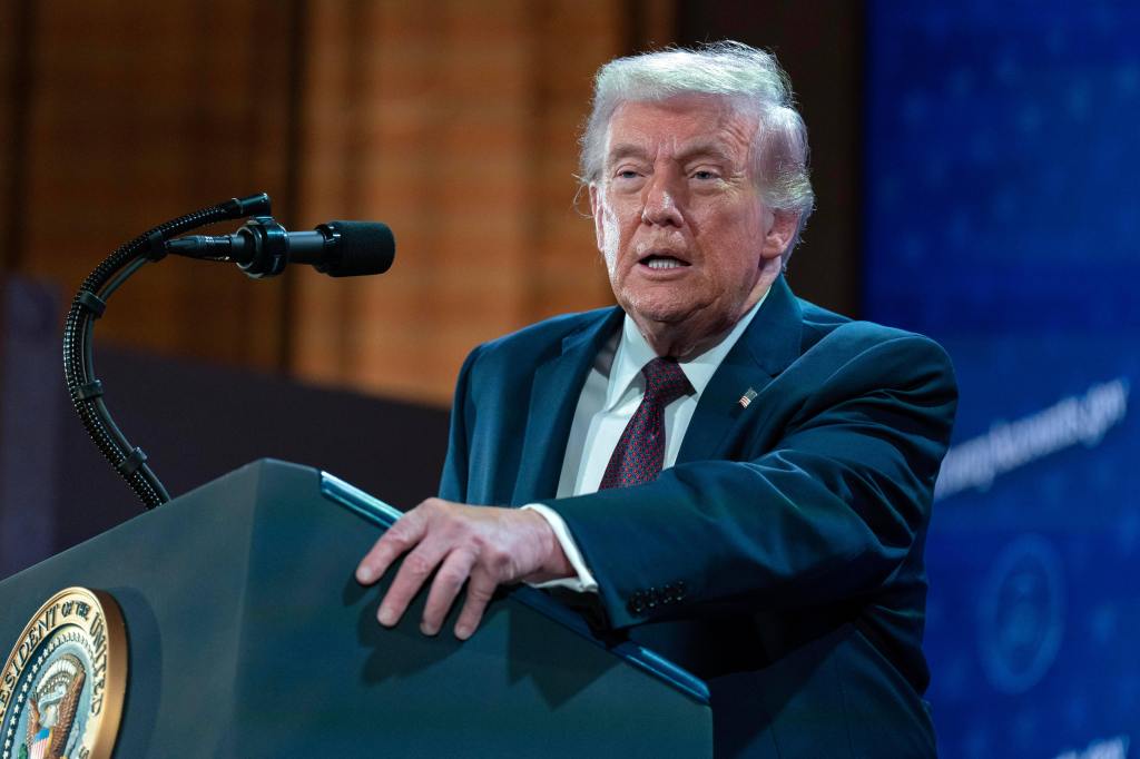 Donald Trump speaking at a podium.