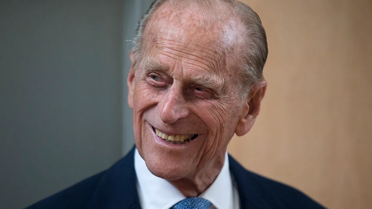 A close-up of Prince Philip smiling.