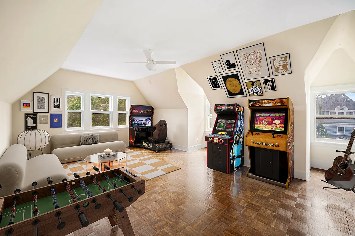 top floor bedroom virtually staged as a family room with games, seating area