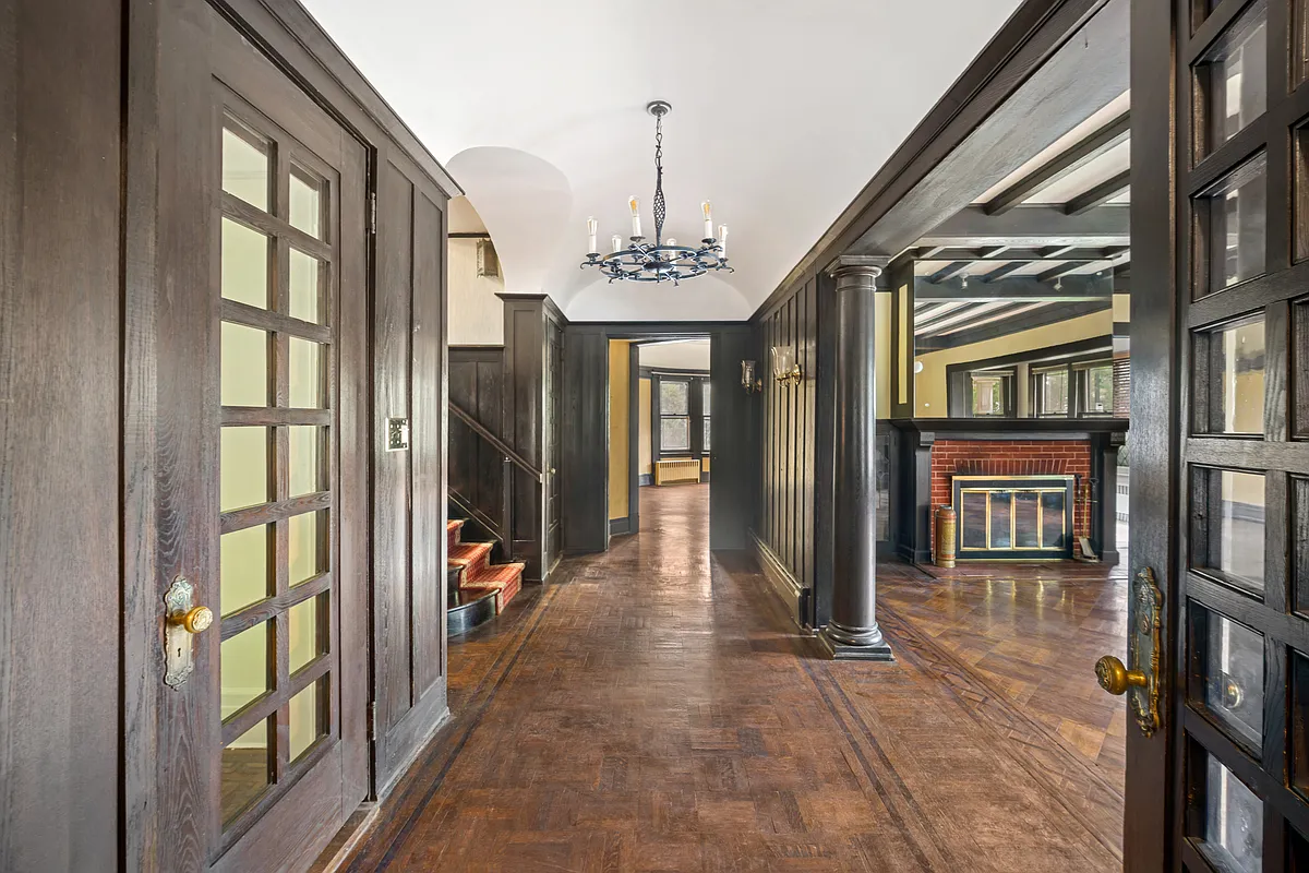 hall with columned divider to parlor