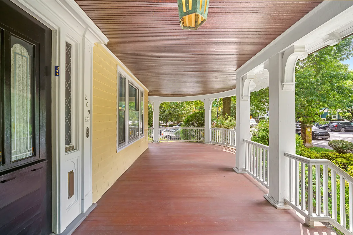 front porch with wood slat ceiling