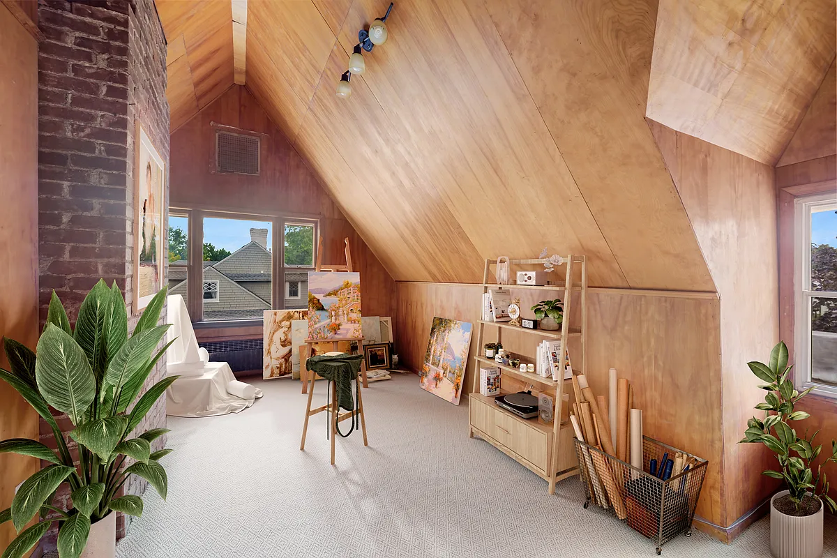 top floor room with paneled walls and ceiling virtually staged as a studio